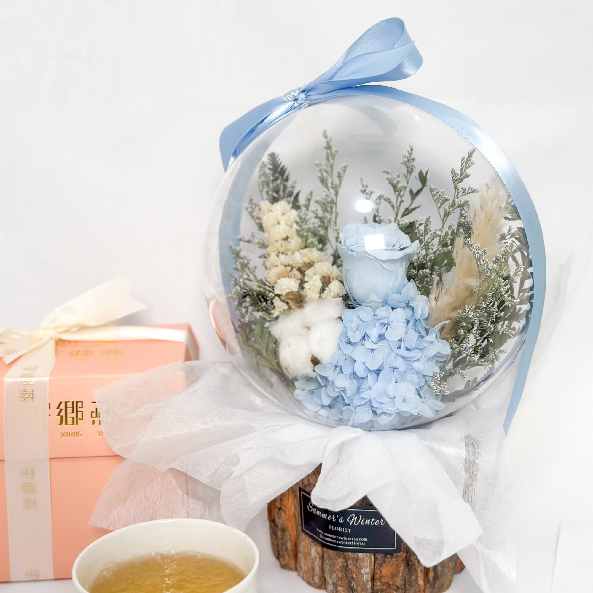 Concentrate Bird's Nest with Blue Rose Crystal Ball Bouquet